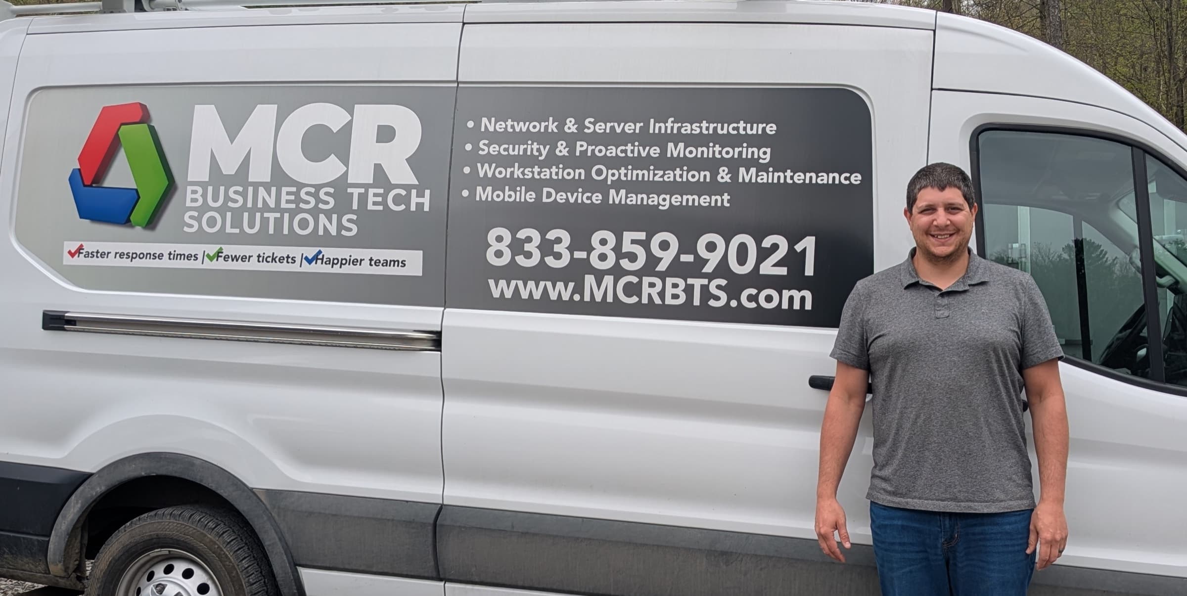 Michael DiLauro, owner of MCR Business Tech Solutions, with the company service van